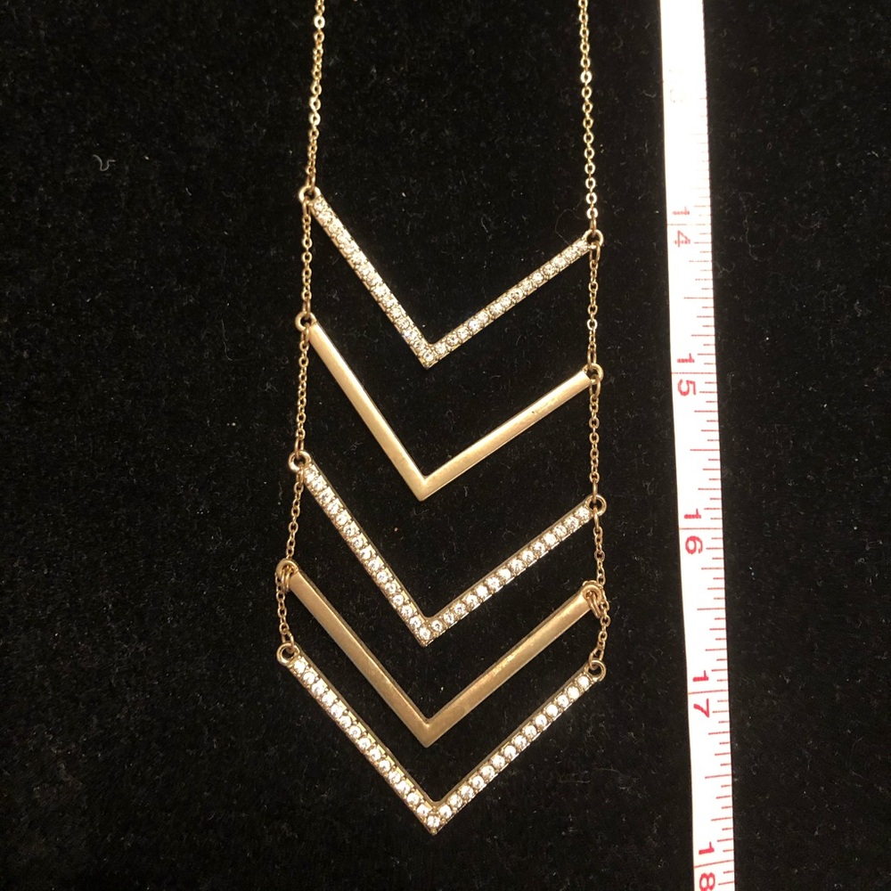 Long gold arrow necklace with rhinestones